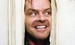 Image from The Shining where Jack Nicholson sticks his head through the crack that he's made in the door.